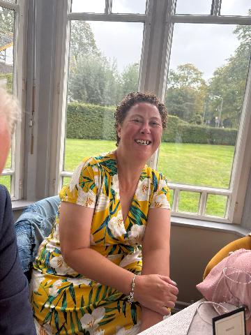 Foto van een gast die plezier heeft